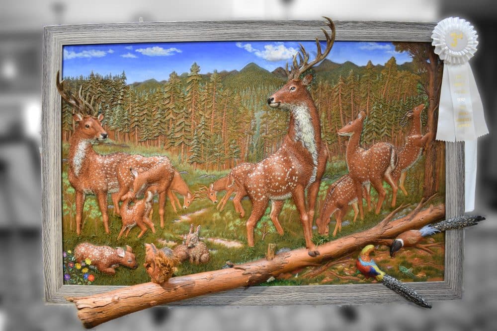 deer in a forest, leather art