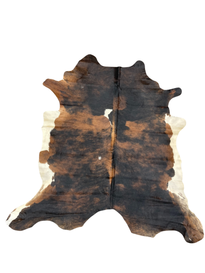 Black, Brown, and White Cow Hide